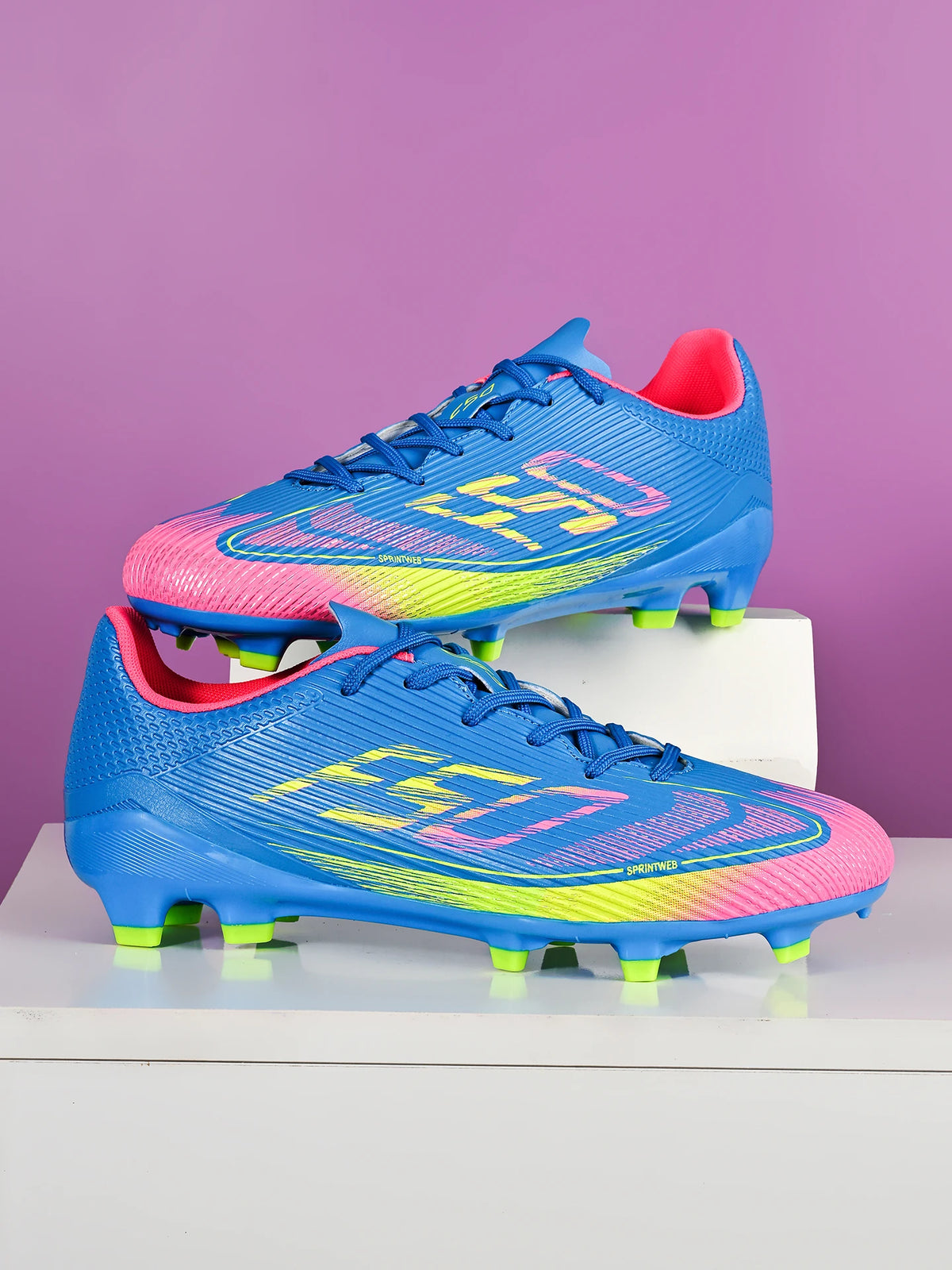 Chaussures de football pour hommes, modèle AG FG hybride, semelle extérieure en caoutchouc résistant à l’usure, tige en PU respirant, idéales pour les matchs sur gazon naturel.