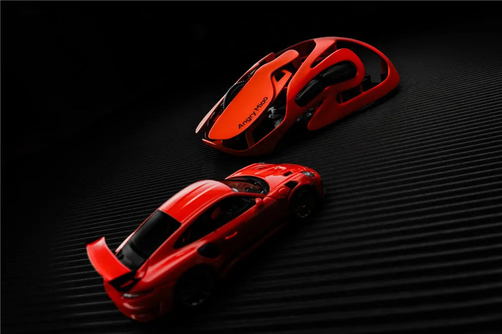 Angry Miao Infinity Mouse Wireless da Gaming Hot-Swappable in Metallo Ultralight Hollow PAW3950 Dual 8K Cablato Tri-Mode Arancione