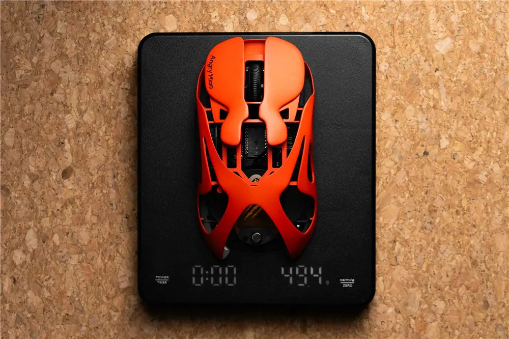 Angry Miao Infinity Mouse Wireless da Gaming Hot-Swappable in Metallo Ultralight Hollow PAW3950 Dual 8K Cablato Tri-Mode Arancione