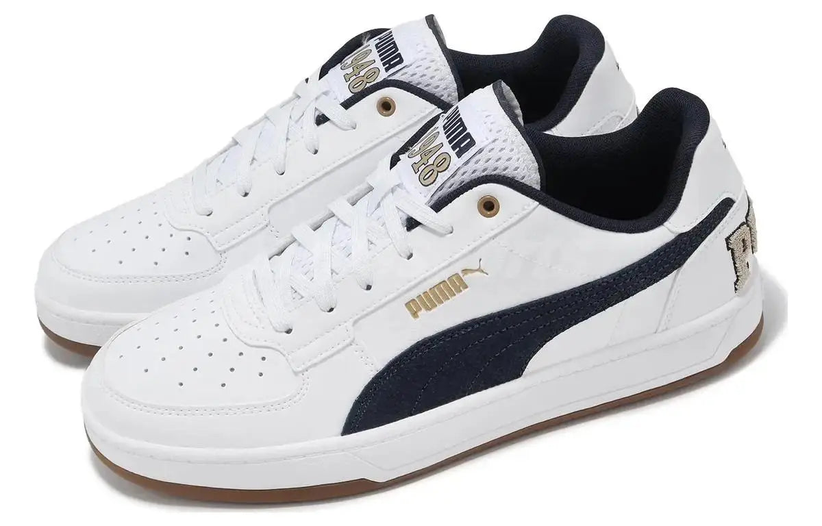 Baskets Puma Caven 2.0 Retro Club, modèle Club, couleur blanc et bleu marine, Prairie Tan, 395082-01.