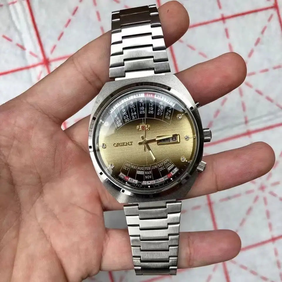 118A Store Orient automatic mechanical unisex watch with large rotating dial, fully functional stainless steel Japanese movement