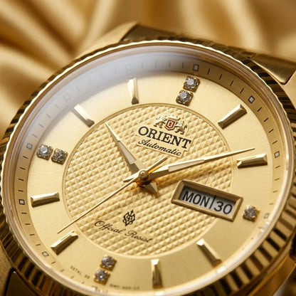 Orientin automaattinen miesten rannekello, jossa on kaksoiskalenteri (päivämäärä ja viikonpäivä), kristallimerkit ja ruostumattomasta teräksestä valmistettu rannekoru – ammattimainen rannekello